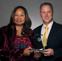 Quida Hartley, customer service representative and platinum ambassador, Hertz; Aaron Medina, regional vice president, Hertz