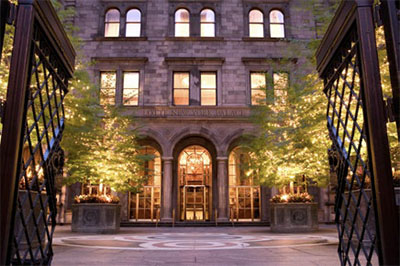 Lotte New York Palace hotel entrance at night